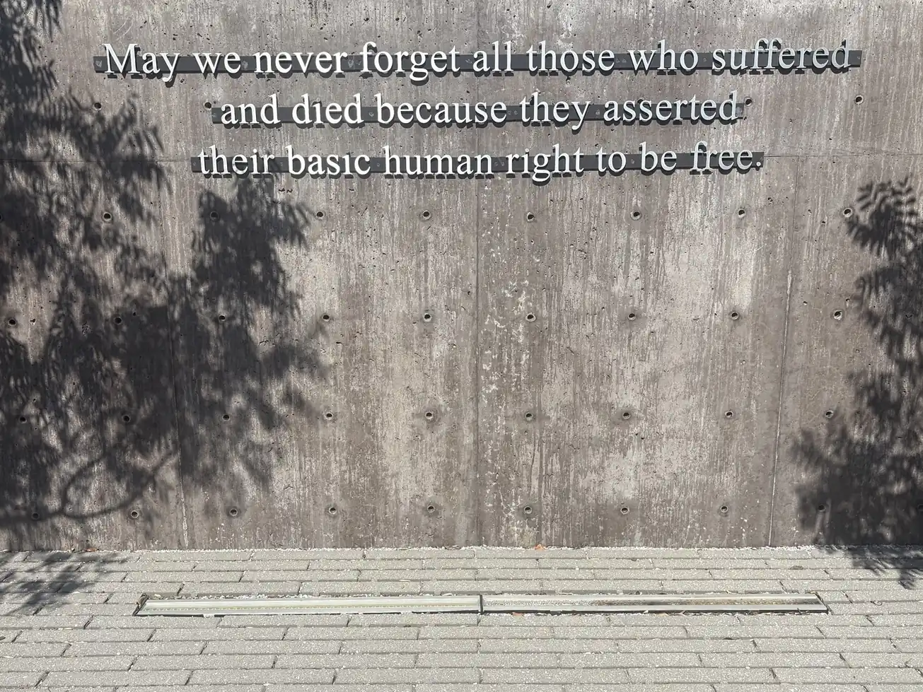 A memorial wall honoring people who suffered and died asserting their right to freedom.